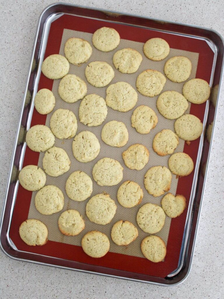 cookies baked on a baking sheet resting