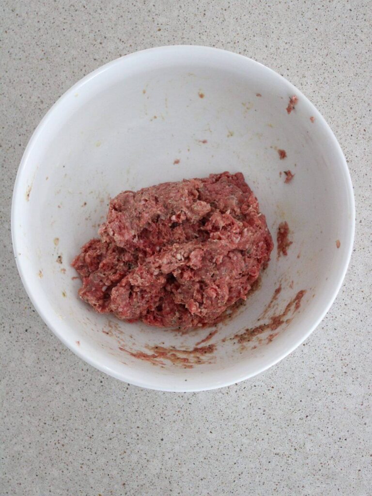 the meatball mixture mixed ready to form into meatballs. 